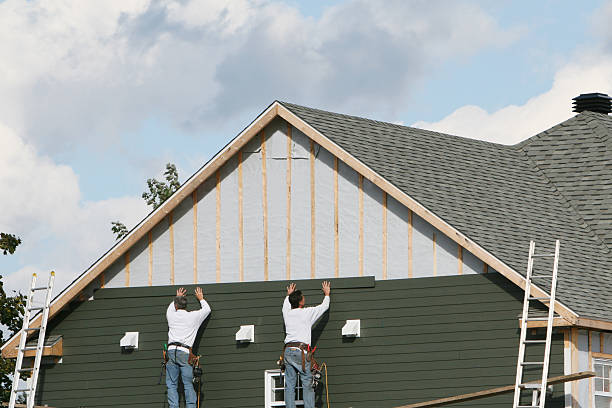 Professional Siding Contractor technician working in Jacksonville, NC
